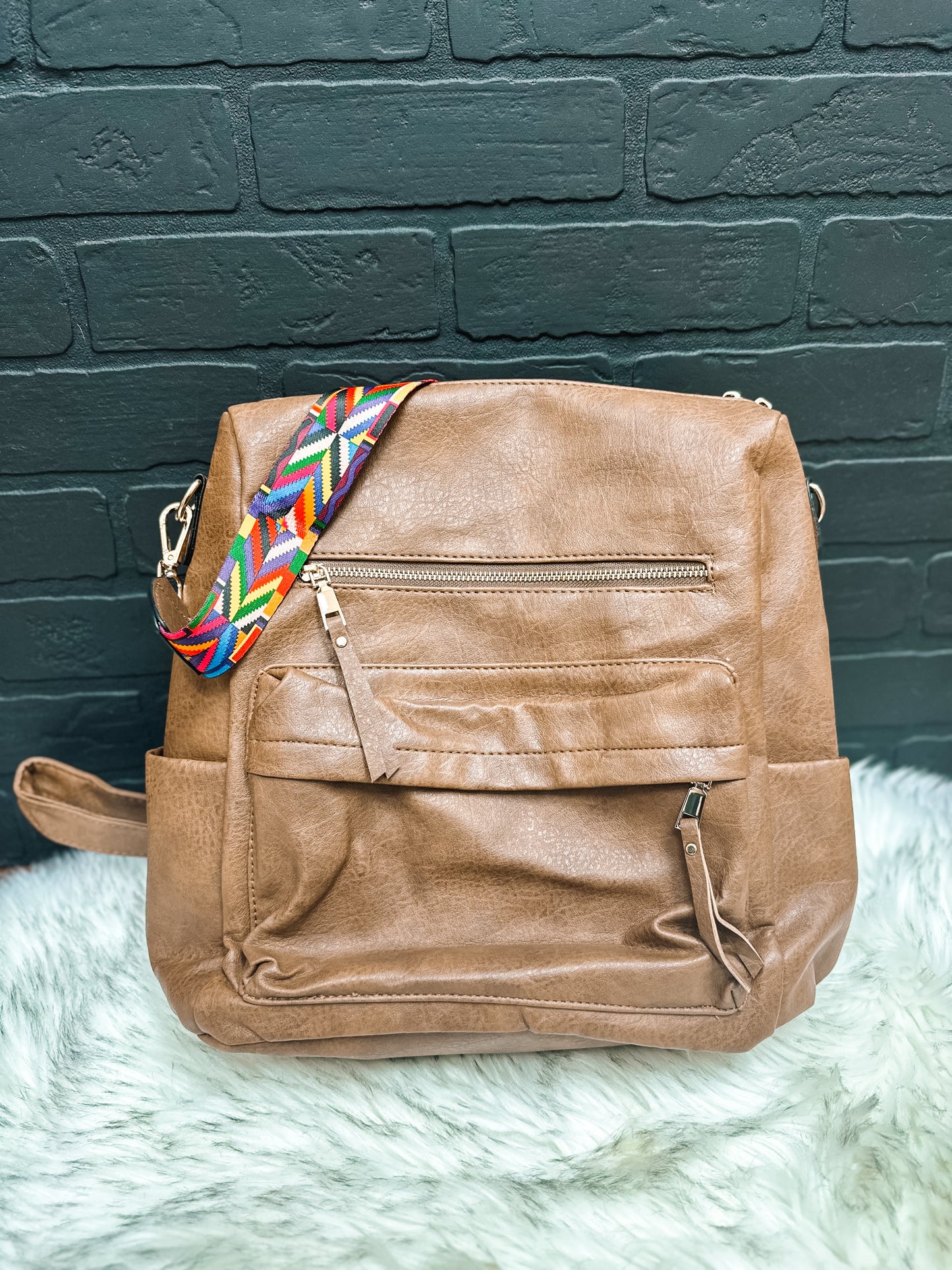 Faux leather back pack with front pocket 