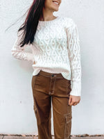 Classy white sweater with knit detail