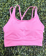 Pink sports bra with removable padding 