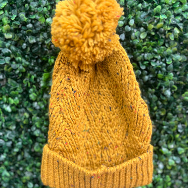 Yellow Pom beanies with confetti detail