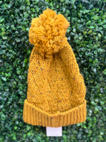 Yellow Pom beanies with confetti detail