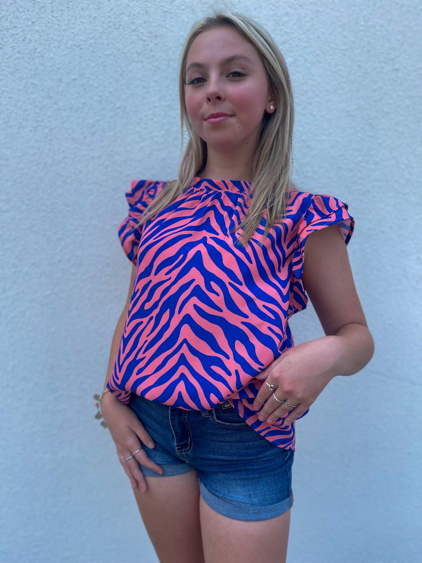 Business casual pink/zebra top with ruffle sleeves 