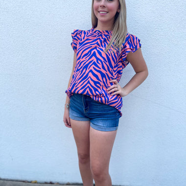 Pink and navy zebra dress top with ruffle arm detail